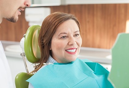 Woman smiling in the dental chair