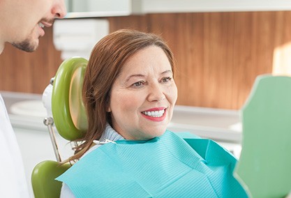 Woman smiling in the dental chair