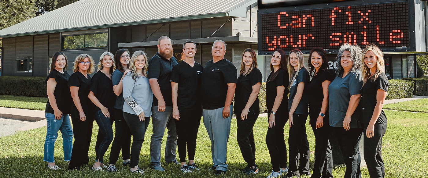 Dentists and dental team outside of dental office